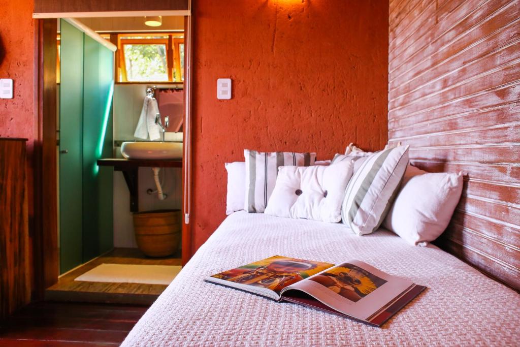 Postel nebo postele na pokoji v ubytování Villa Arumã Pousada