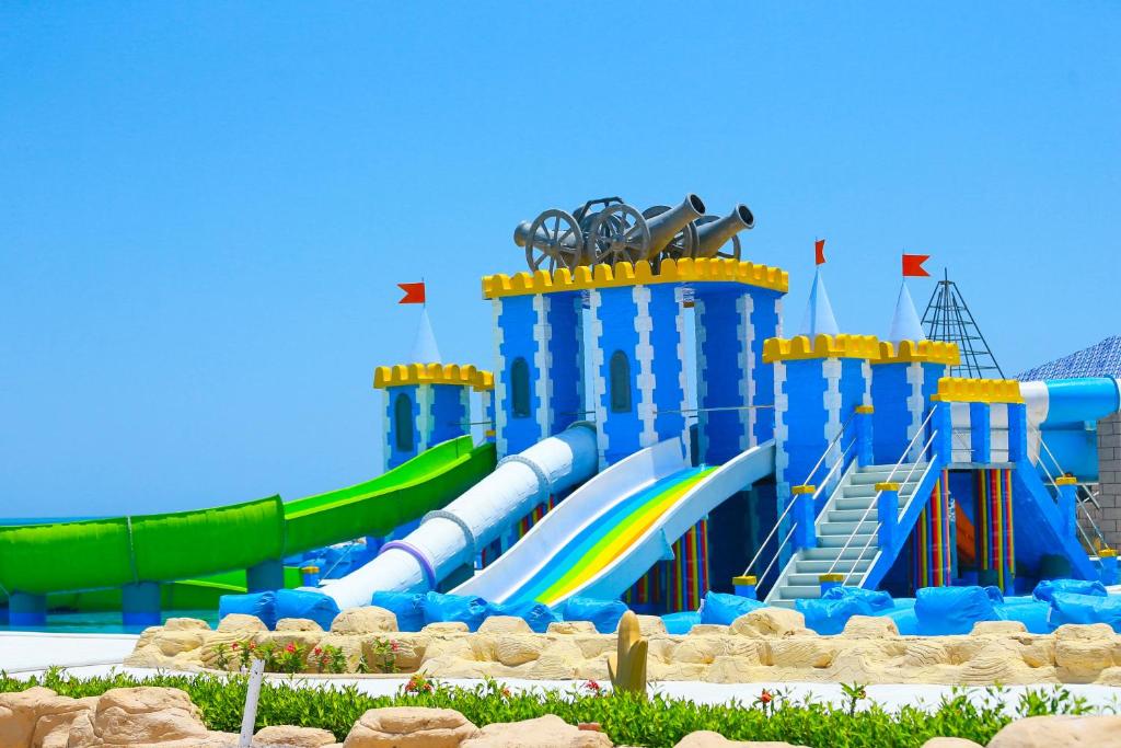 a water park with a water slide and a water slide at Gravity Hotel & Aqua Park Hurghada Families and Couples Only in Hurghada