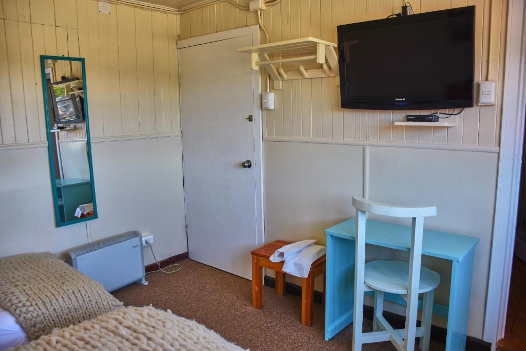 TV a/nebo společenská místnost v ubytování Hostal Triwe