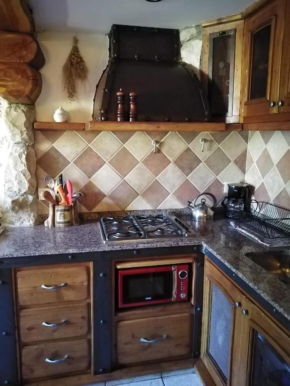 Kuchyň nebo kuchyňský kout v ubytování Las Baitas