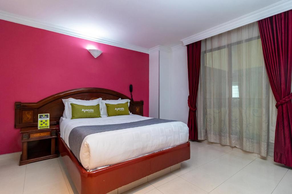 Postel nebo postele na pokoji v ubytování Lavid Hotel Palacio Real