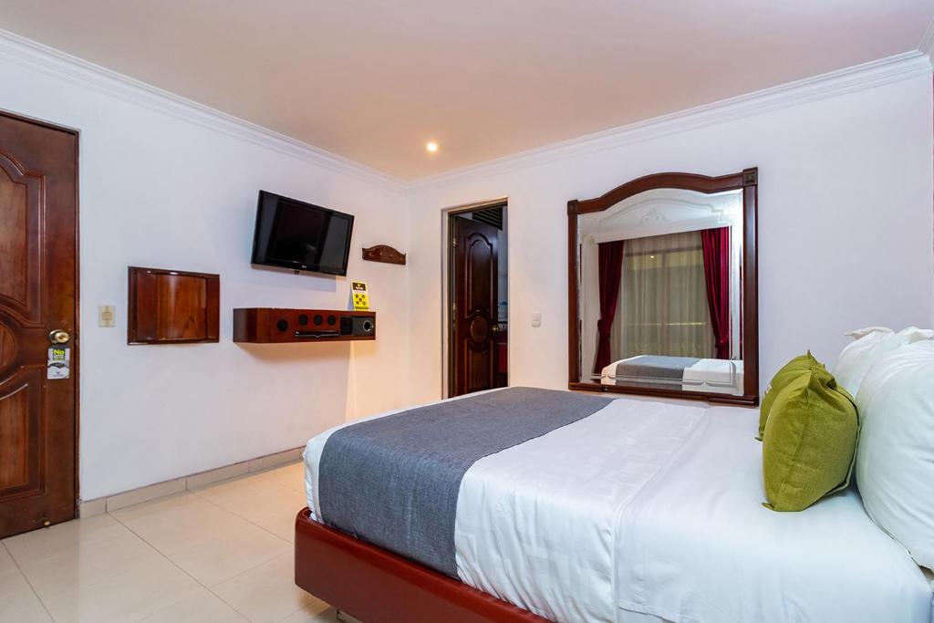 Postel nebo postele na pokoji v ubytování Lavid Hotel Palacio Real