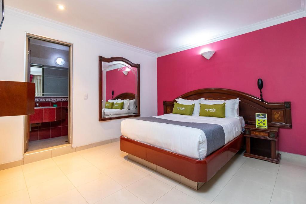 Postel nebo postele na pokoji v ubytování Lavid Hotel Palacio Real
