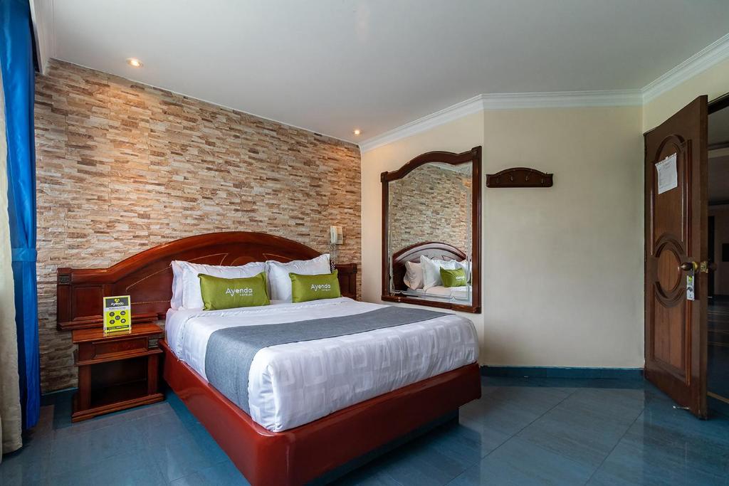 Postel nebo postele na pokoji v ubytování Lavid Hotel Palacio Real