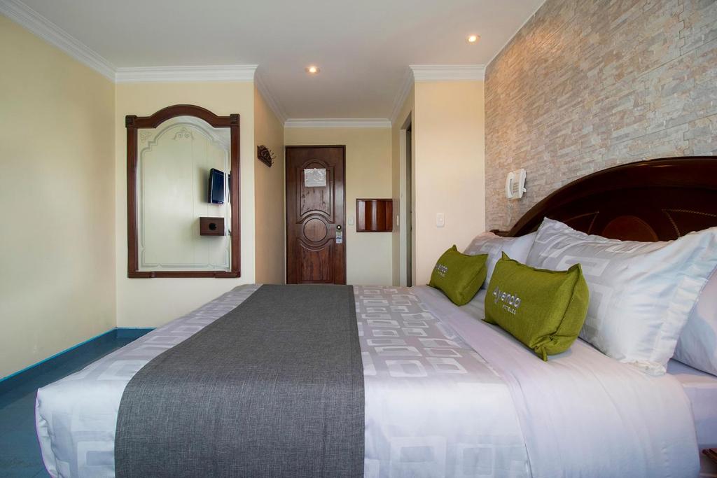 Postel nebo postele na pokoji v ubytování Lavid Hotel Palacio Real