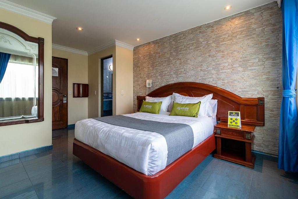 Postel nebo postele na pokoji v ubytování Lavid Hotel Palacio Real