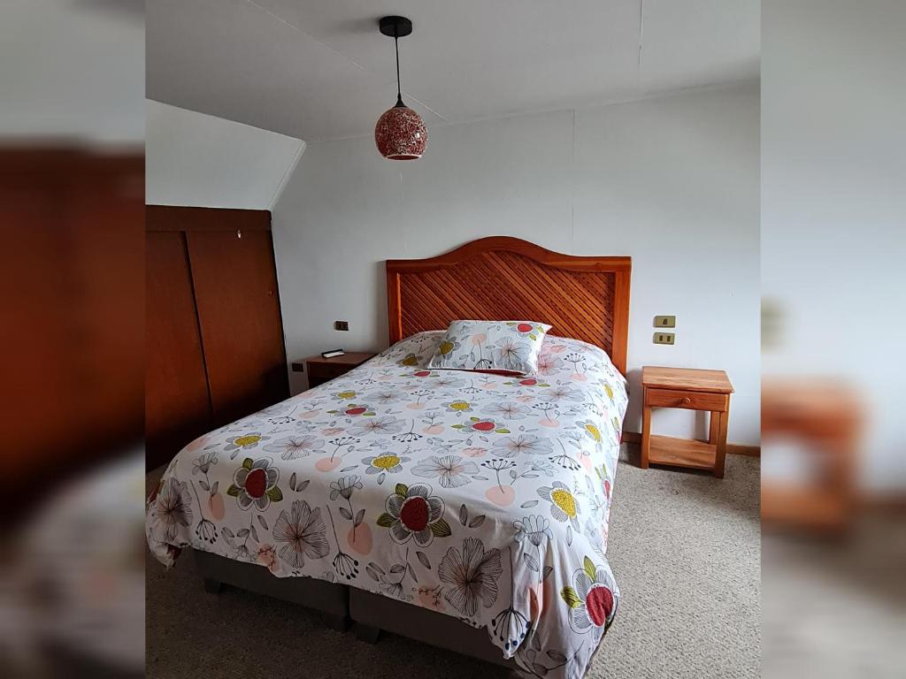 Ένα ή περισσότερα κρεβάτια σε δωμάτιο στο Habitación con baño privado vista al volcán