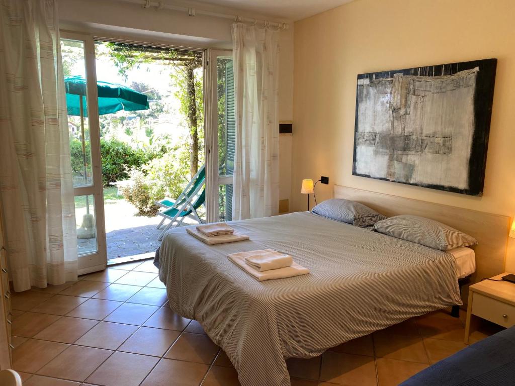 Кровать или кровати в номере Belvedere Residenza Mediterranea
