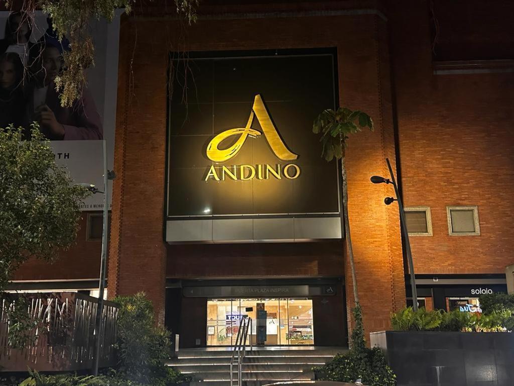 a andino sign on the side of a building at Horizon 85 Lofts Zona T in Bogotá