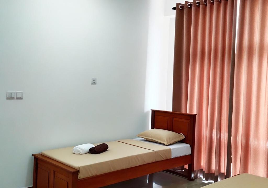 Postel nebo postele na pokoji v ubytování Shine Ray VILLA