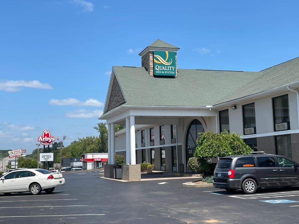 a store with cars parked in a parking lot at Quality Inn & Suites in Somerset