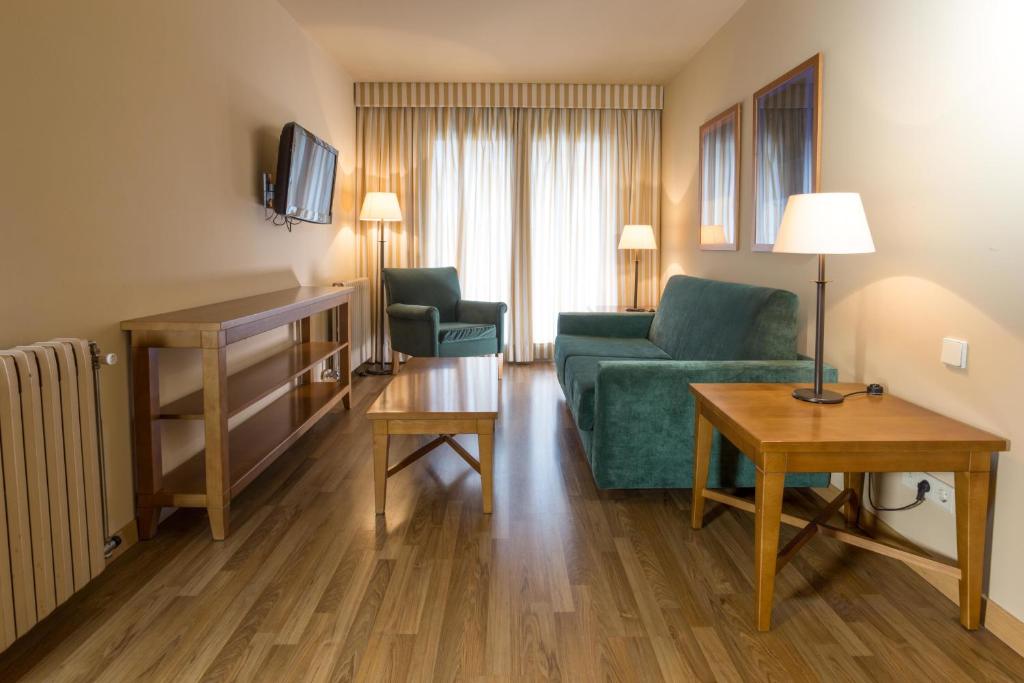 TV a/nebo společenská místnost v ubytování Apartaments Shusski
