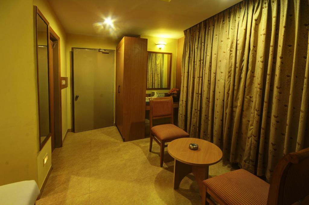 Posezení v ubytování Hotel Roopa