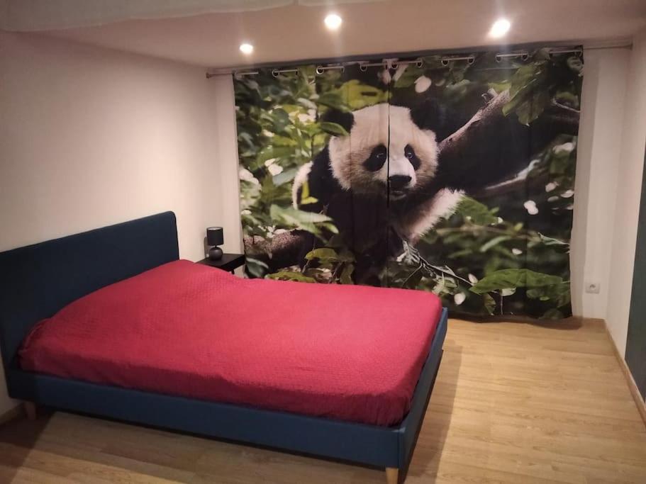 Postel nebo postele na pokoji v ubytování La Tanière des Pandas