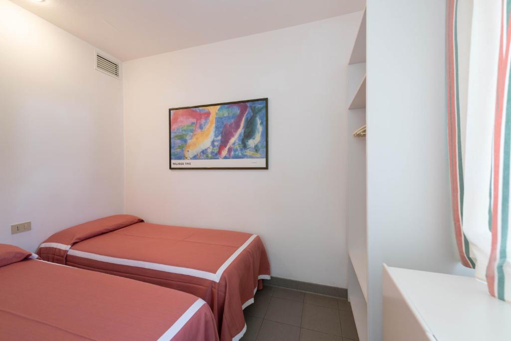 Letto o letti in una camera di Art&Park Hotel Union Lido