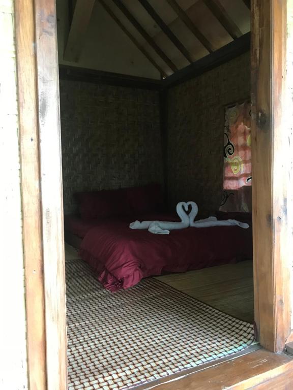 Postel nebo postele na pokoji v ubytování Vanilla Garden