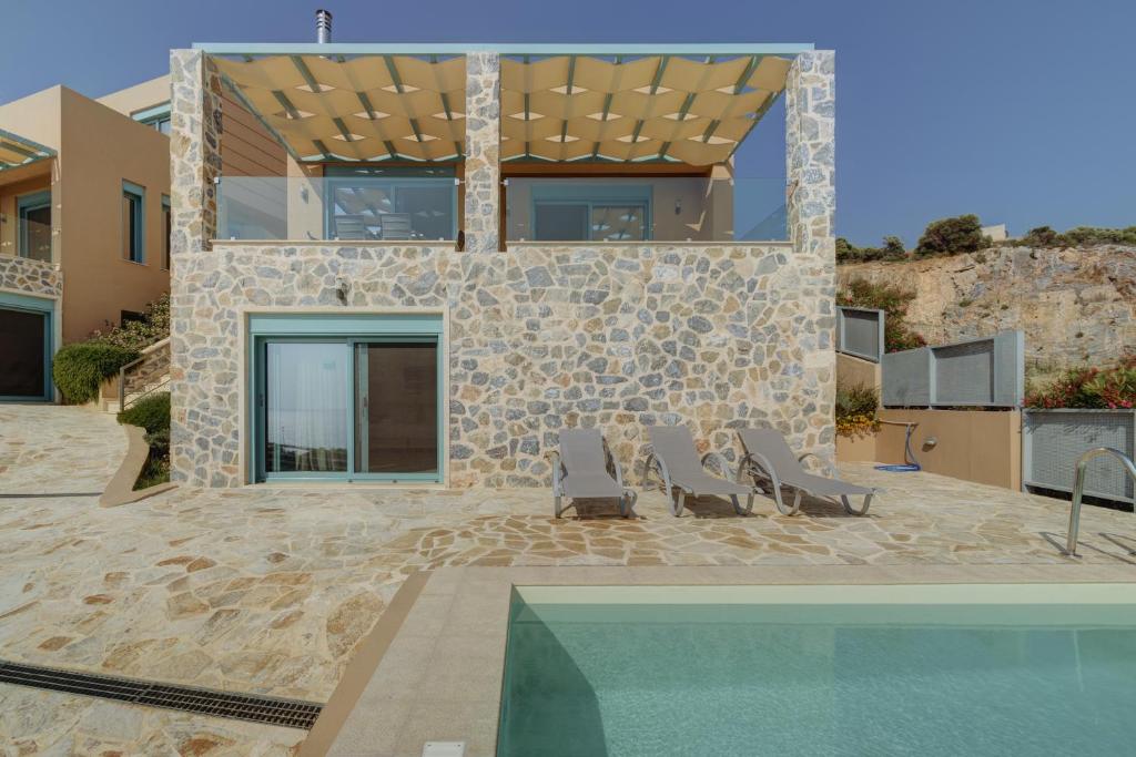 Bazén v ubytování Ouzo Panoramic Houses 2, with private pool nebo v jeho okolí