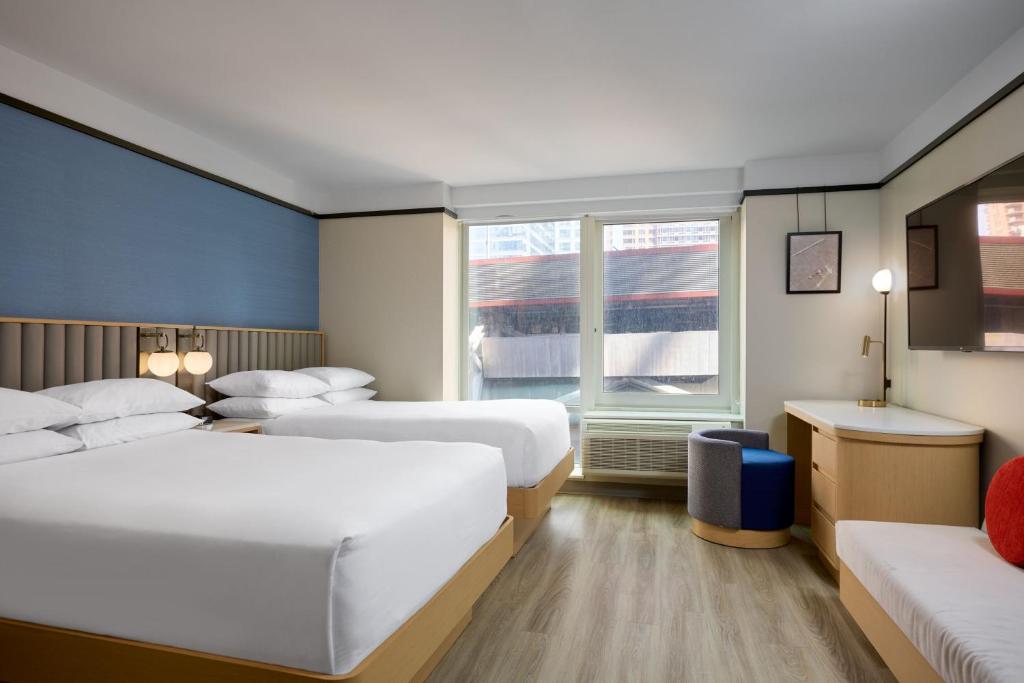 Postel nebo postele na pokoji v ubytování Delta Hotels by Marriott New York Times Square