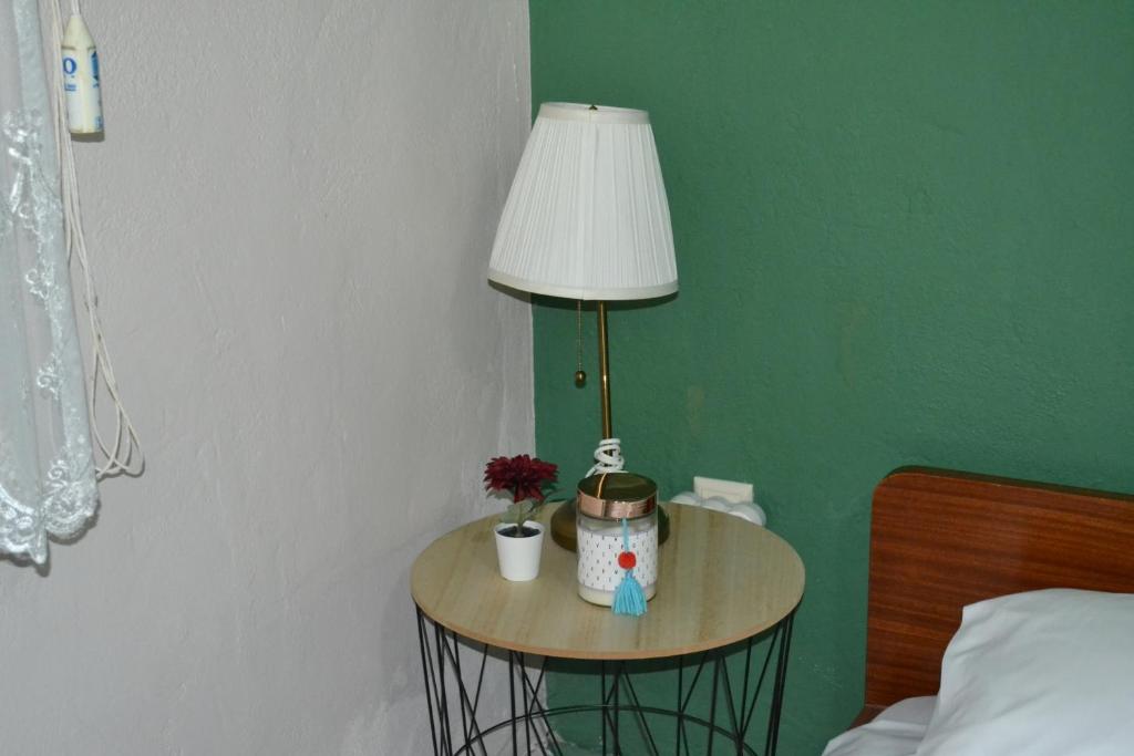 A bed or beds in a room at Casa de Pozar
