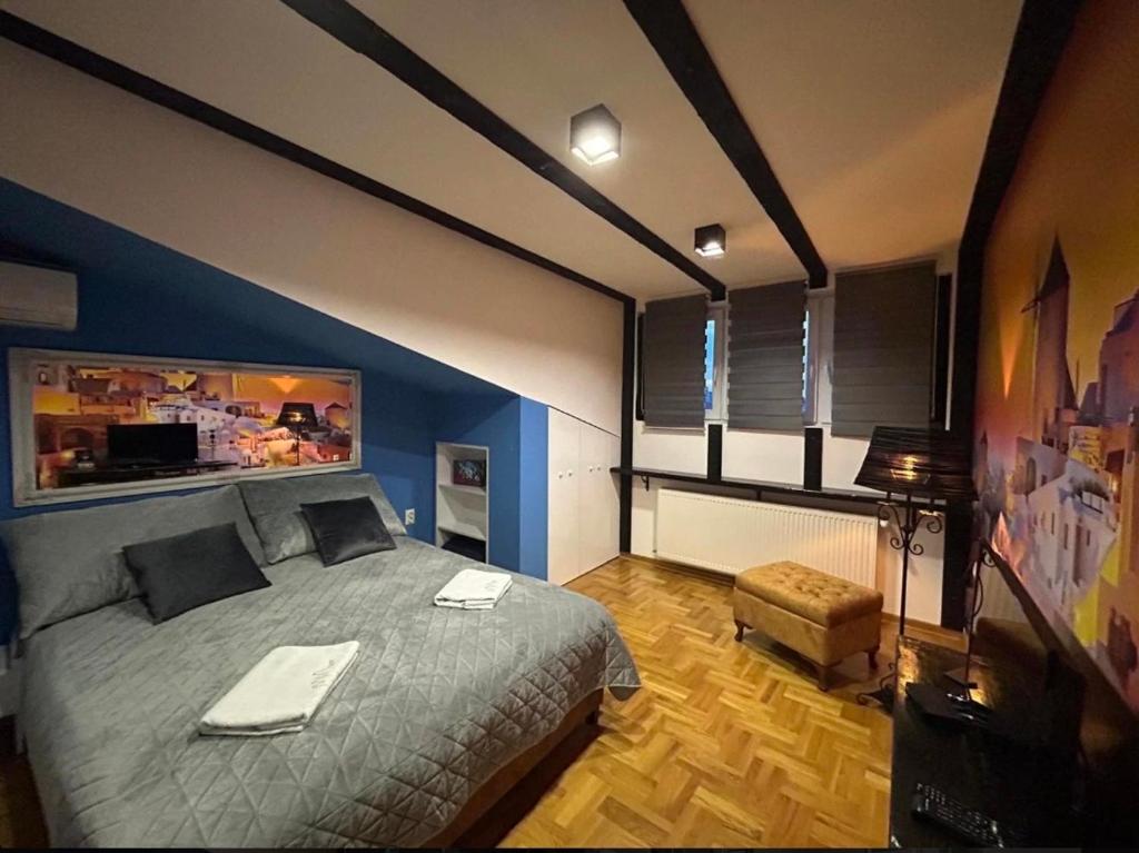 Postel nebo postele na pokoji v ubytování MM Apartman