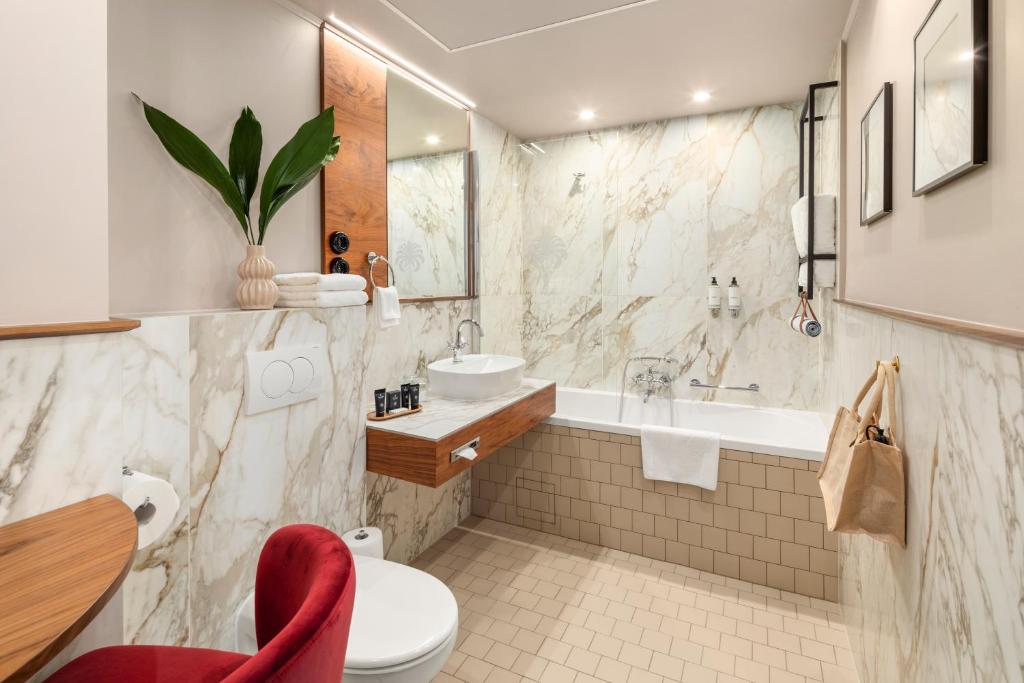 Queen's Court Hotel & Residence - Resim 40