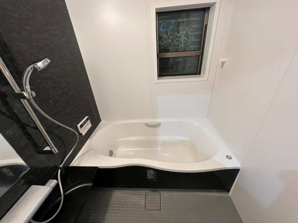 Koupelna v ubytování Guesthouse Kaede Annex