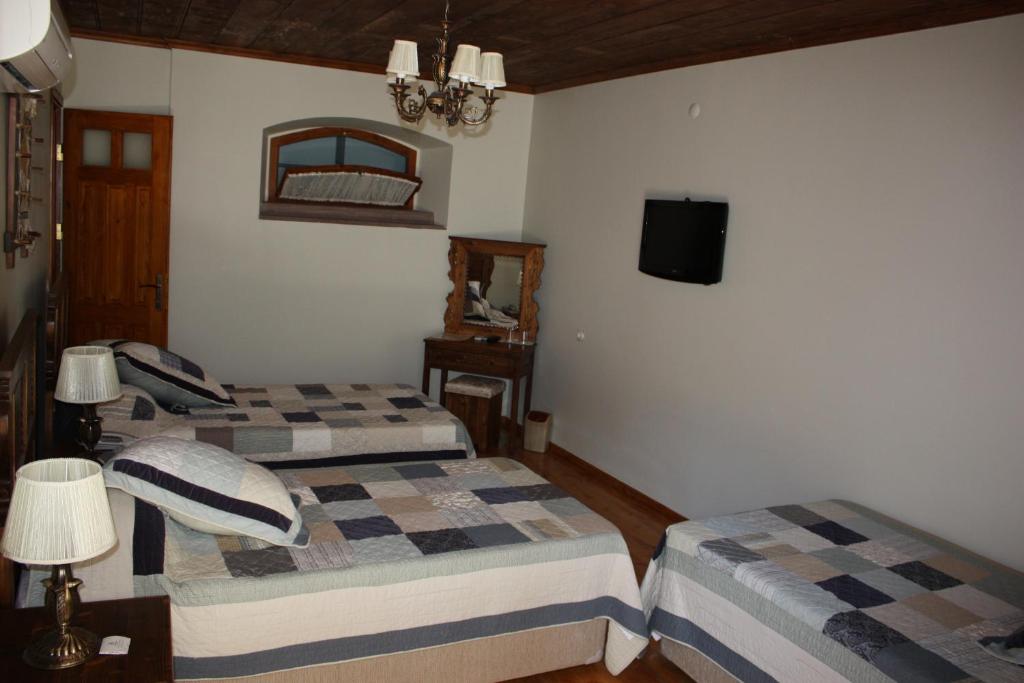 Postel nebo postele na pokoji v ubytování Hera Hotel