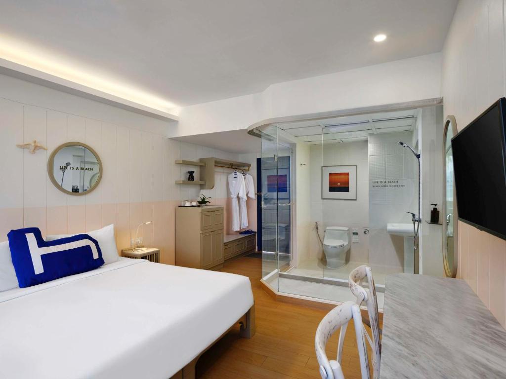 Postel nebo postele na pokoji v ubytování HOMM Bliss Southbeach Patong