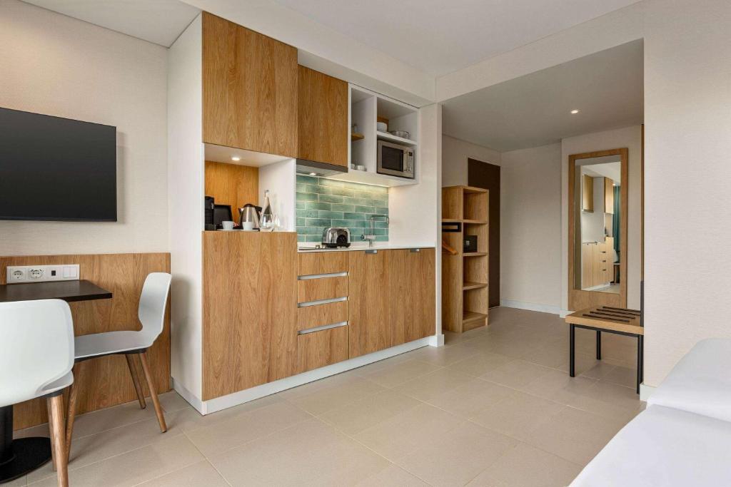 Kuchyň nebo kuchyňský kout v ubytování Wyndham Residences Alvor Beach