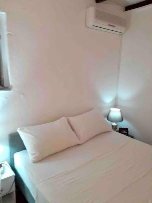 Postel nebo postele na pokoji v ubytování Apartment di Matteo