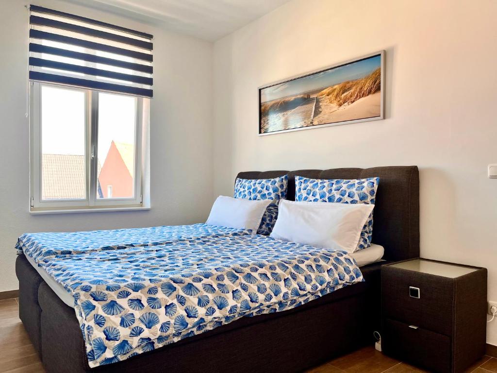 Säng eller sängar i ett rum på Modern family apartment in Bamberg