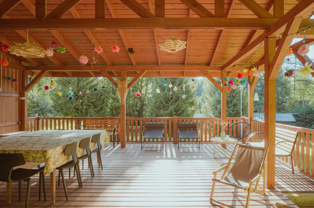 Balkón nebo terasa v ubytování Pustelnia Supraśl - domki nad rzeką