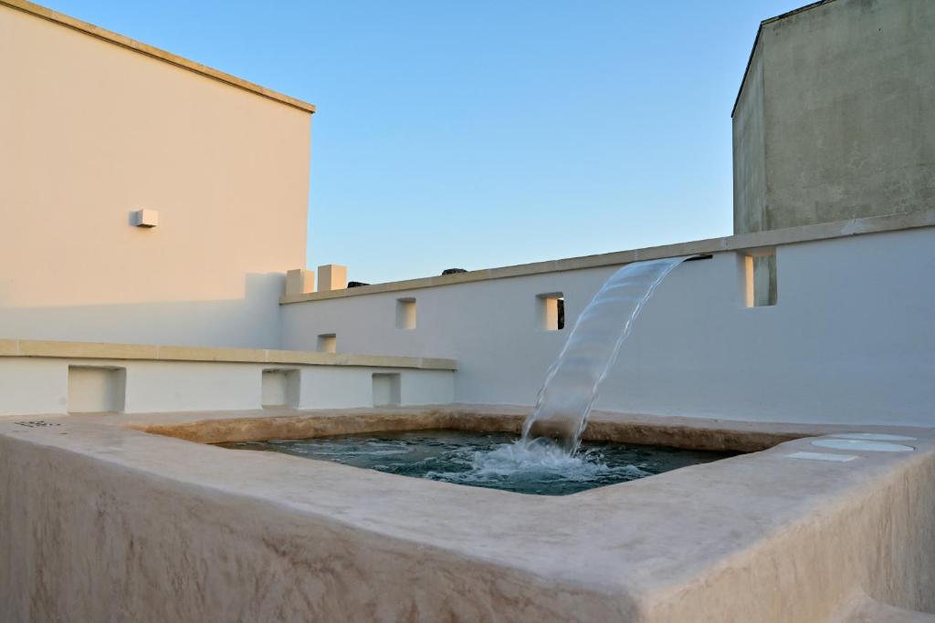 Bazén v ubytování Jrooms - Apulian Home nebo v jeho okolí
