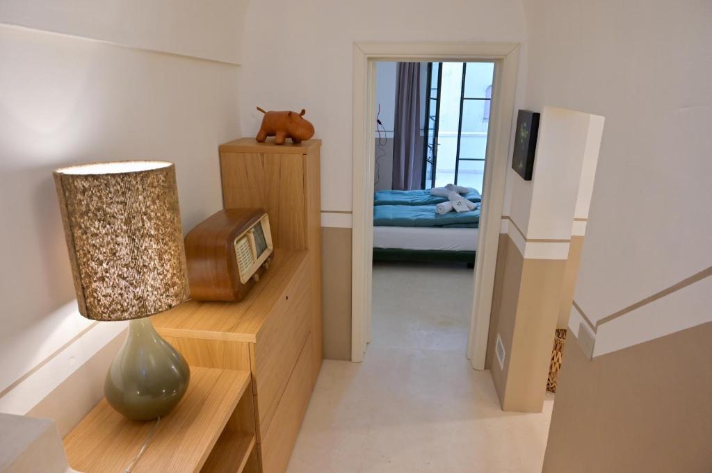 Postel nebo postele na pokoji v ubytování Jrooms - Apulian Home
