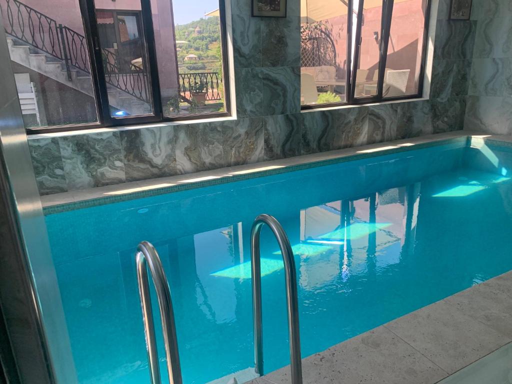 Bazén v ubytování Harmony Resort nebo v jeho okolí