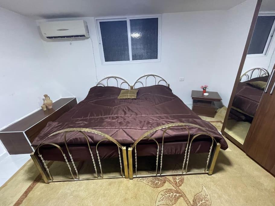 Postel nebo postele na pokoji v ubytování Beit Al Hasan بيت الحسن