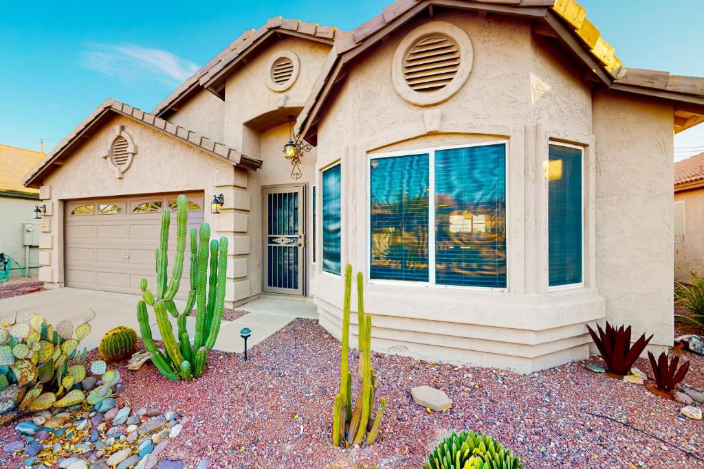 a house with cacti in front of it at Gold Canyon Getaway in Gold Canyon