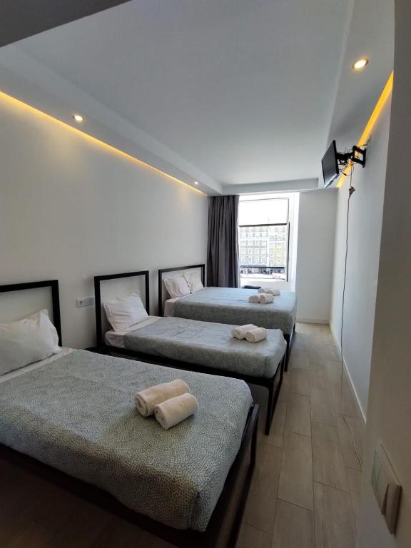 Postel nebo postele na pokoji v ubytování Figueira House in Beira Minho