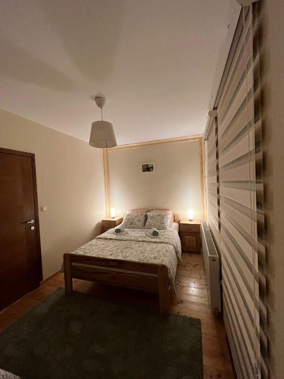 Postel nebo postele na pokoji v ubytování Duša Zlatara