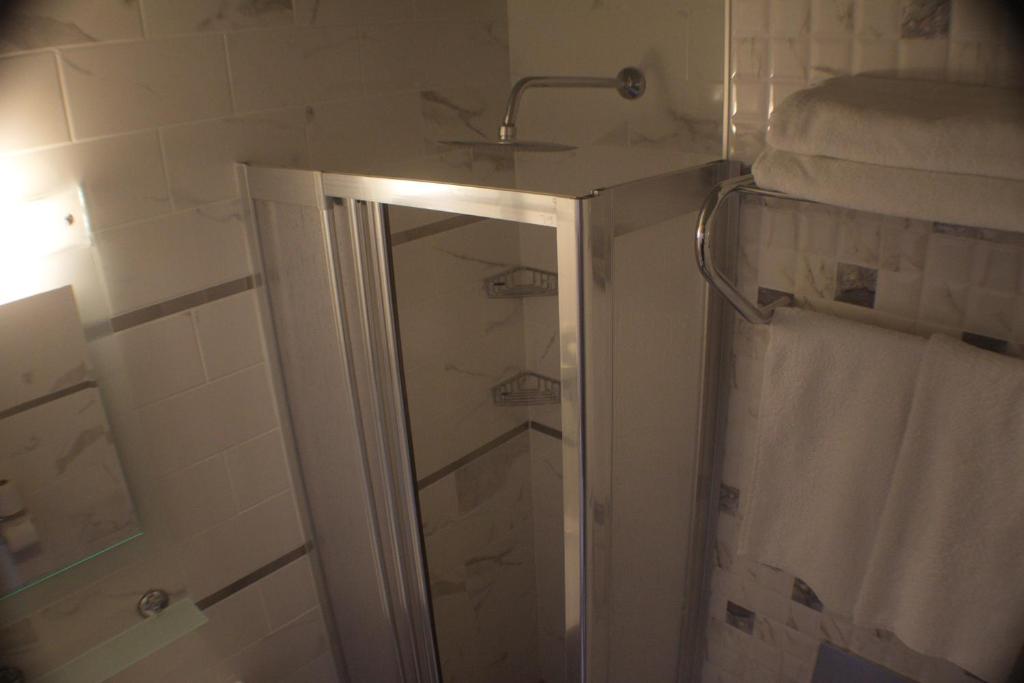 Koupelna v ubytování Remer Hotel