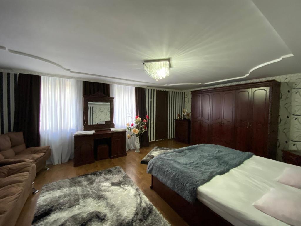 Postel nebo postele na pokoji v ubytování Guest House Misho