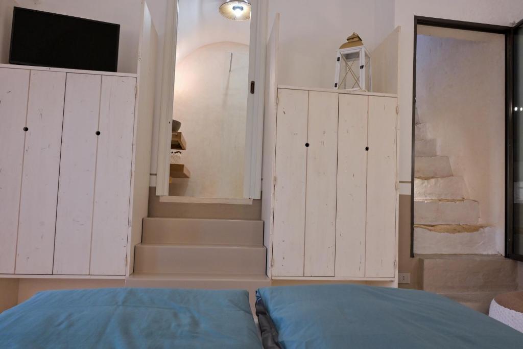 Postel nebo postele na pokoji v ubytování Jrooms - Apulian Home