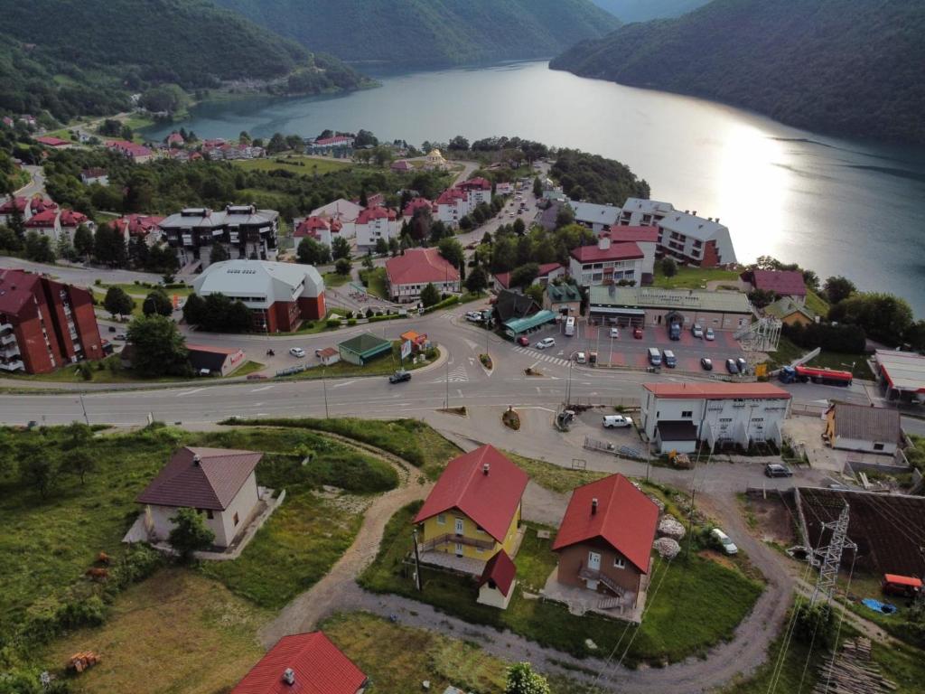 an aerial view of a small town next to a lake at Apartman Ognjenović in Pluzine