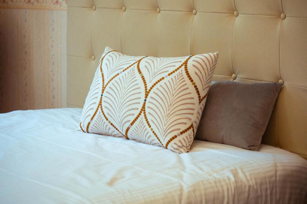 Postel nebo postele na pokoji v ubytování Grand Hôtel du Parc