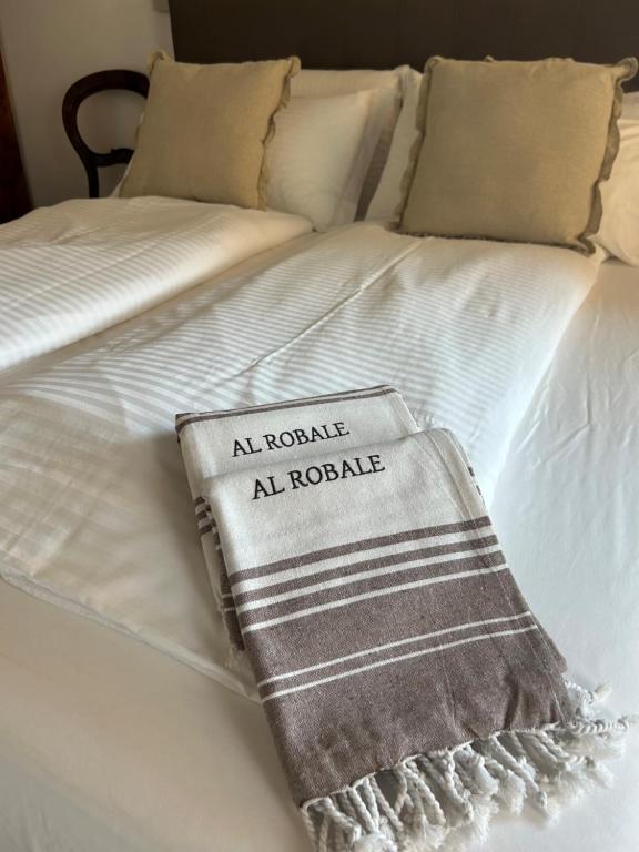 A bed or beds in a room at Agriturismo Al Robale
