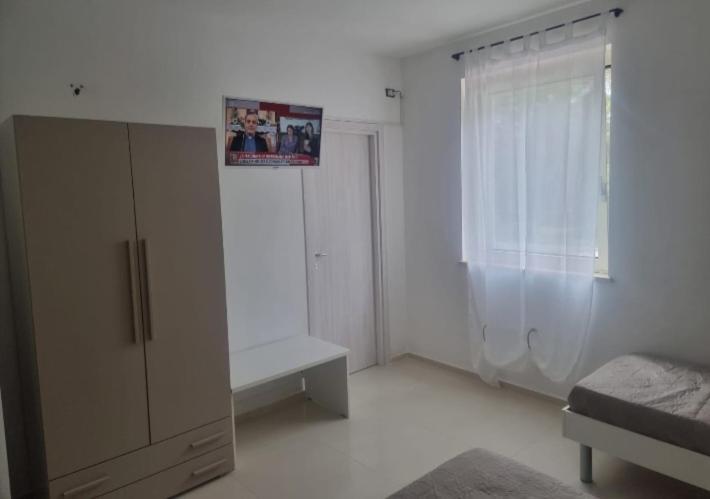 Postel nebo postele na pokoji v ubytování B&B Le perle fg
