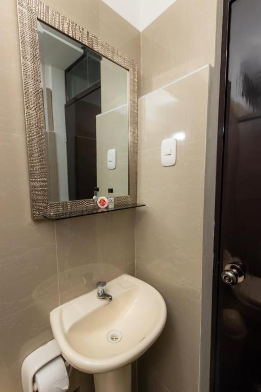 Koupelna v ubytování GOYA HOTEL