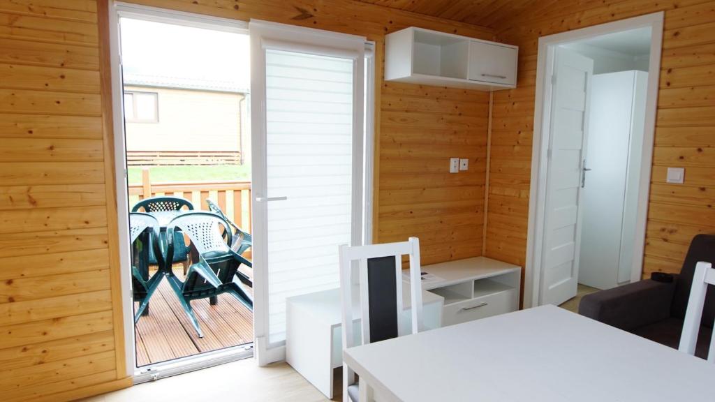Postel nebo postele na pokoji v ubytování Bungalow Camping Bieska Osada