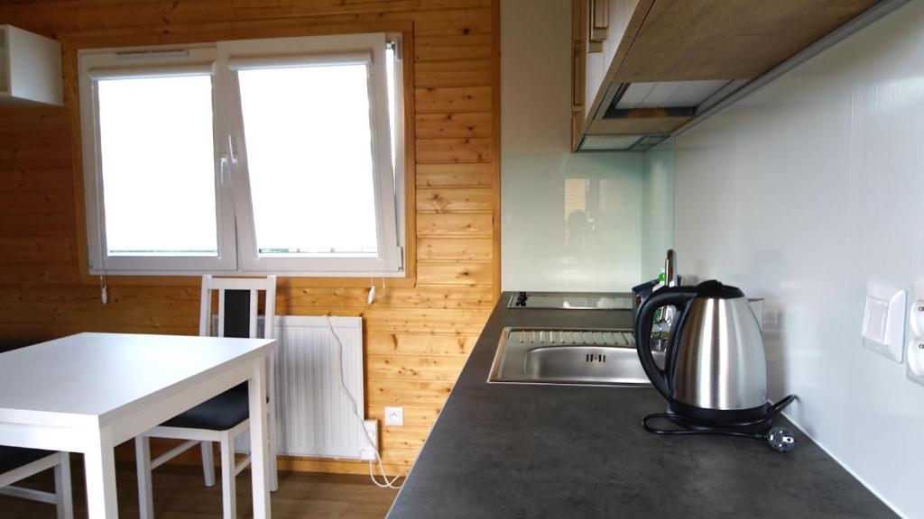 Kuchyň nebo kuchyňský kout v ubytování Bungalow Camping Bieska Osada