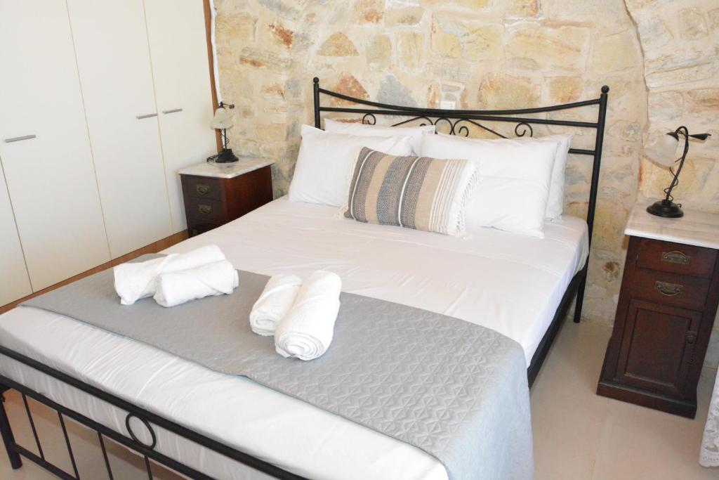 Voodi või voodid majutusasutuse Aretousa Residence in Naoussa, Paros toas